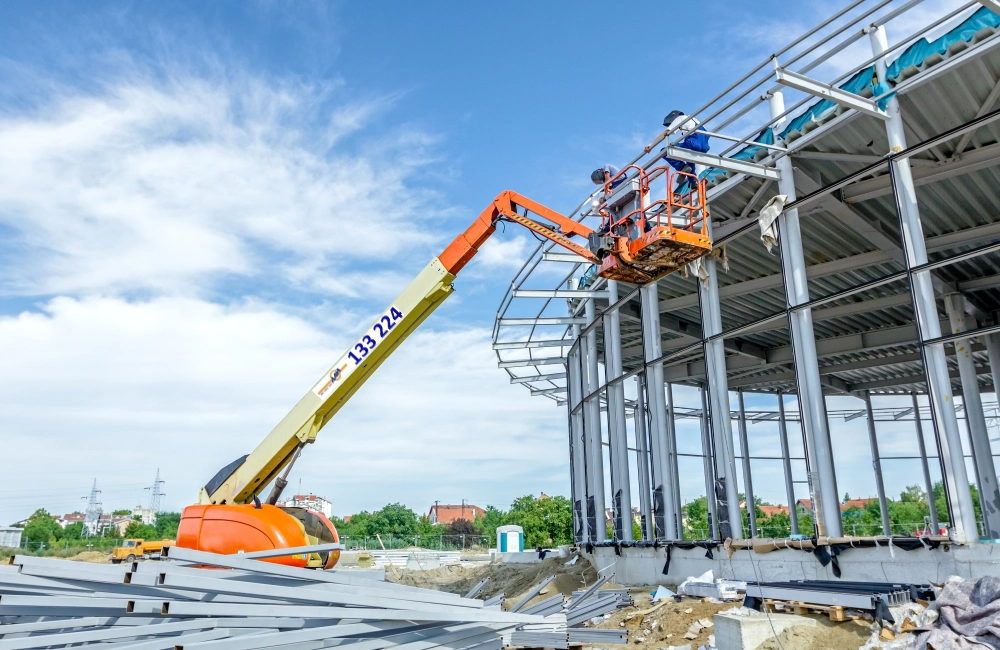JLG straight boom hired from AAH working on a construction site in Sydney, Australia